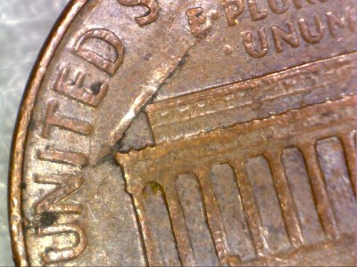 1966-Lincoln-Penny,-Lamination-Error-Across-Obverse-And-?