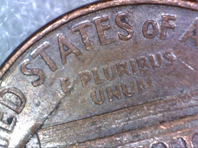 1966-Lincoln-Penny,-Lamination-Error-Across-Obverse-And-?