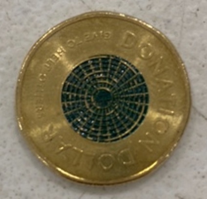 A-Coin-Designed-To-Be-Given,-Not-Collected
