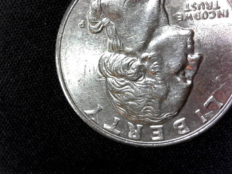 1997-P-Quarter---Lots-Going-On-On-Obverse?-Motto,-Eye,-Back-Of-Head?