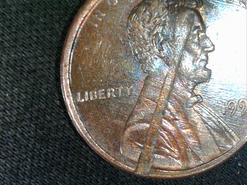 1998-P-Lincoln-Cent-With-Struck-Through-Planchet?-During-Blanking-Press?