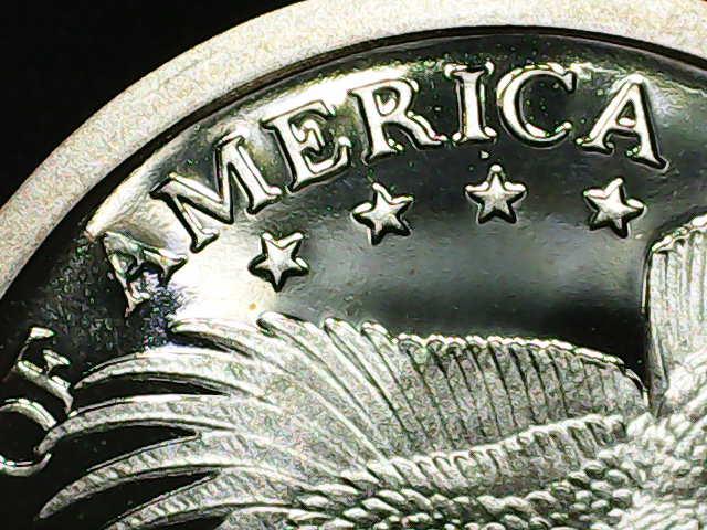 2003-S-Sacagawea-Dollar-Proof-Has-Damage-On-The-First-A-In-America.-Is-This-Grease-On-The-Die?