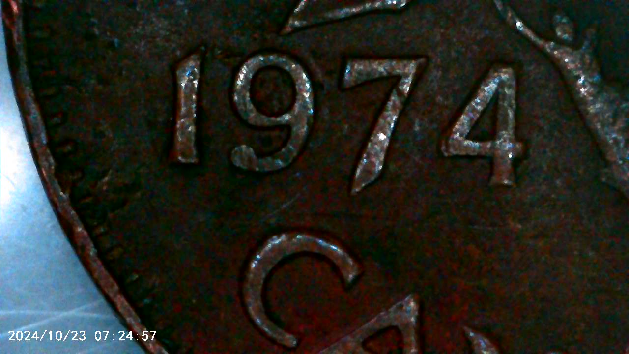 1974-Canadian-Penny-With-A-Strange-9,-4-And-Also-Twisted