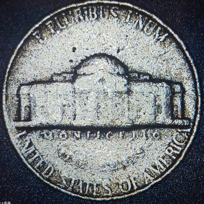 Curious-If-This-1989-P-Nickel-Is-Environmental-Or-A-Possible-Mint-Anomaly?