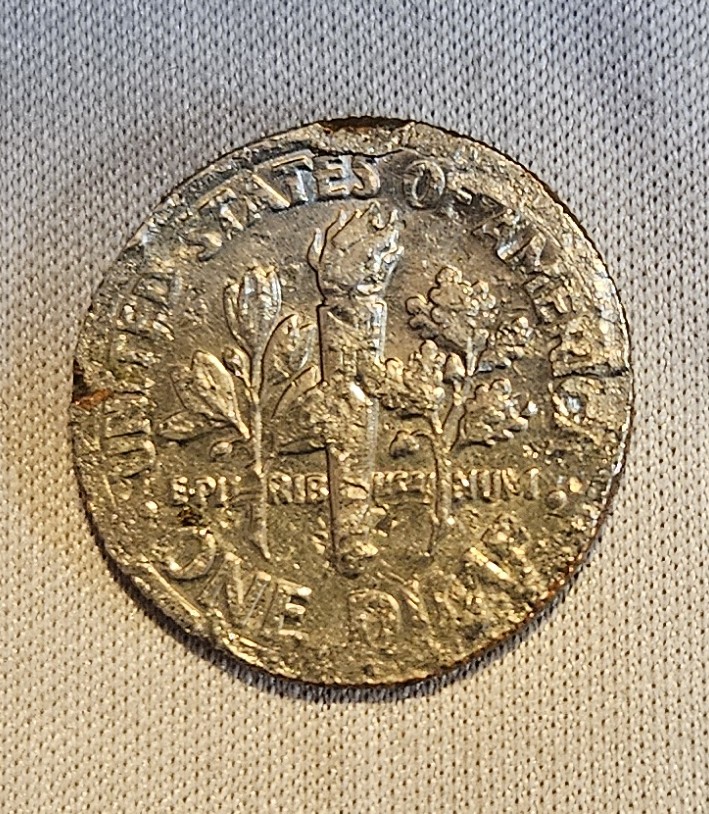 Tell-Me-What-Someone-Did-To-This-1998?-Roosevelt--Dime?