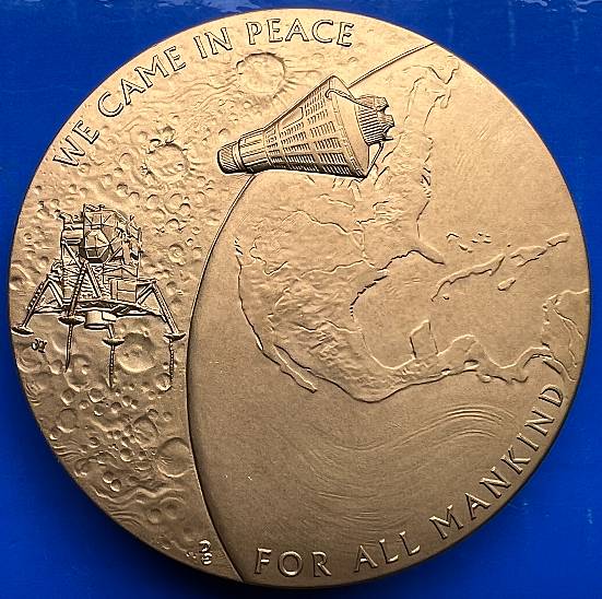 Post-A-Coin-Or-Medal-Related-To-Space-Travel.