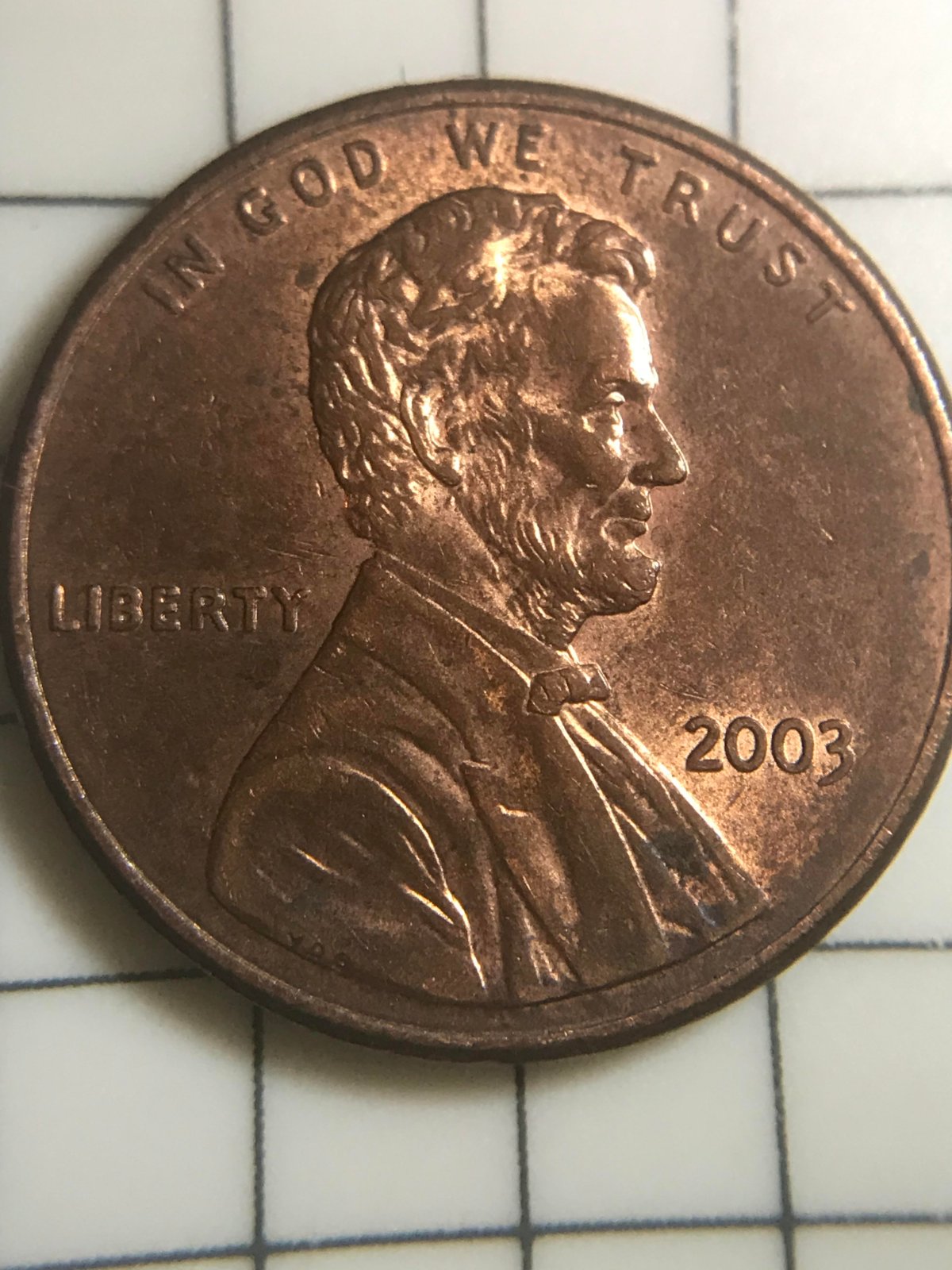 2003-Lincoln-Cent,-Die-Chip-Or-DDO-Of-The-Ear?