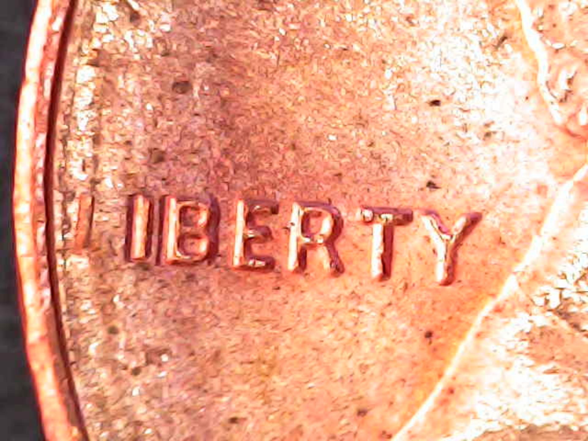 Can-Anyone-Help-Me-Figure-Out-What's-Wrong-With-This-1986-Penny?
