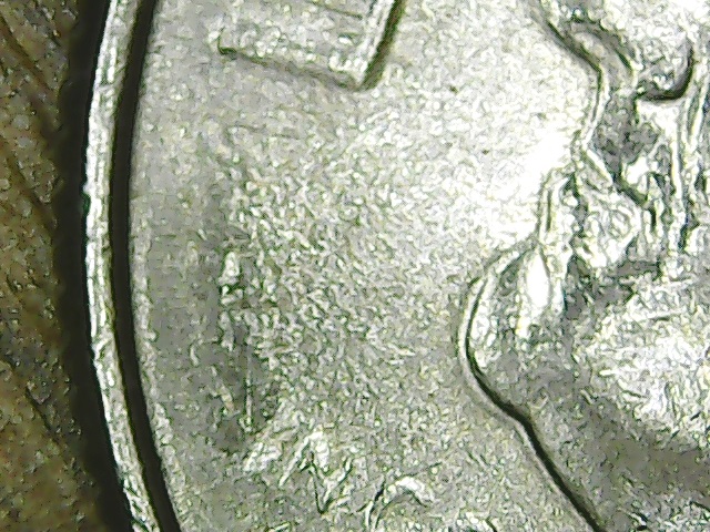 2015--P-Dime,--Obverse-Struck-By-Some-Other-Coin-Die?