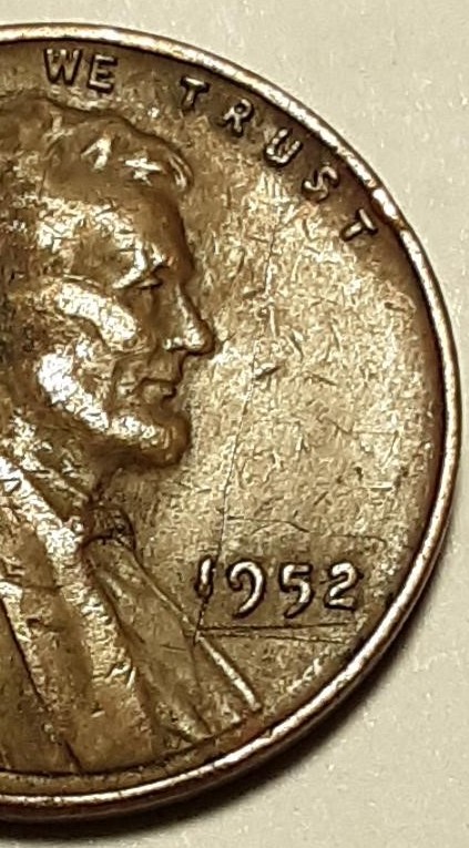 1952-Penny-With-Lines-Under-The-Date