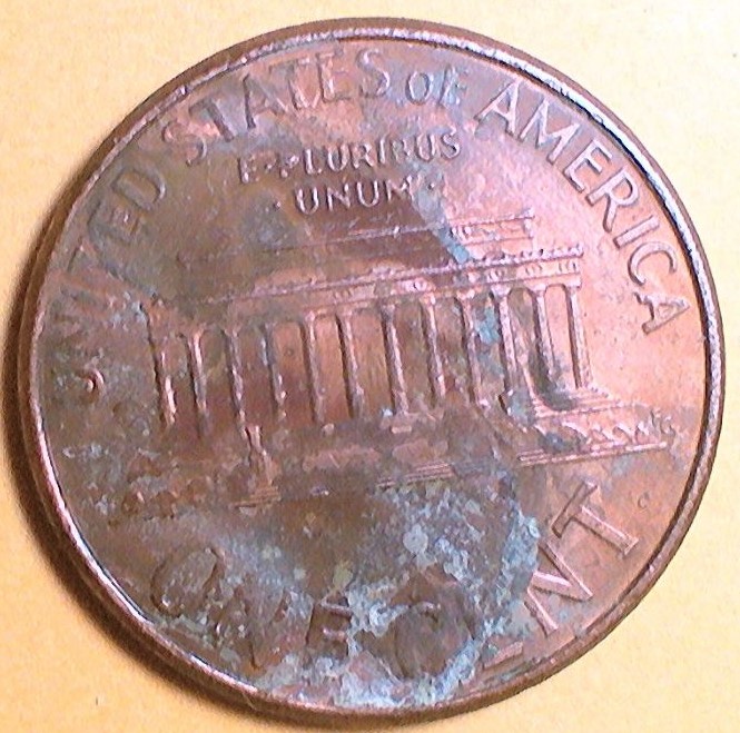 1999-Penny-With-Wide-AM-In-Damaged--Shape