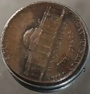 1979-Nickel-On-Penny-Planchet?
