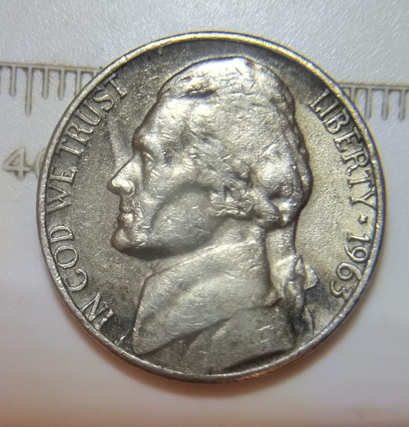1963-D-Jefferson-Nickel-Strikethrough-Grease