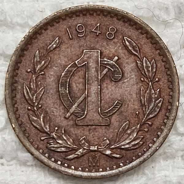 Post-Your-Coins-And-Medals-Featuring-A-Snake.