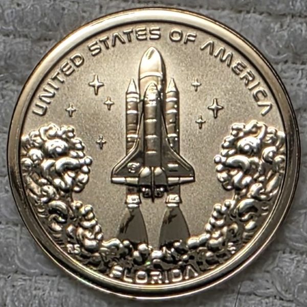Post-A-Coin-Or-Medal-Related-To-Space-Travel.