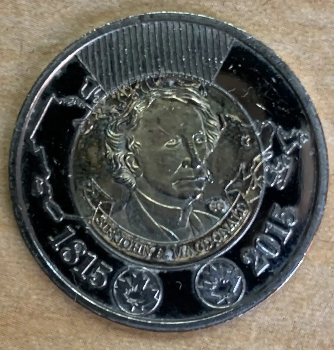 2015-Double-Date-Sir-John-A-Macdonald-Toonie-With-RCM-Logo-On-The-Obverse