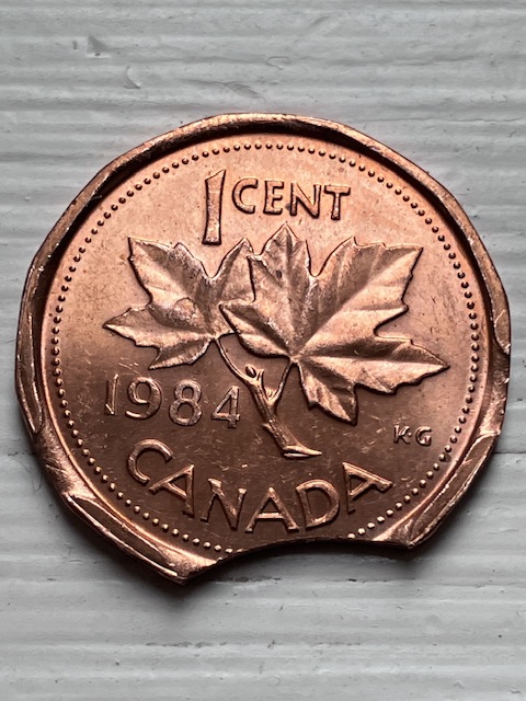 Picked-This-Triple-Clip-Cent-Out-Of-A-Junk-Box.