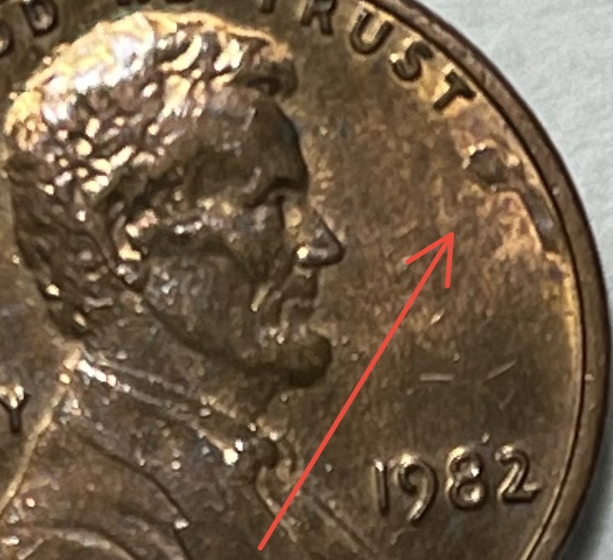 Completely-New,-What's-This-Rose-Looking-Blemish-After-Trust?-1982-Cent