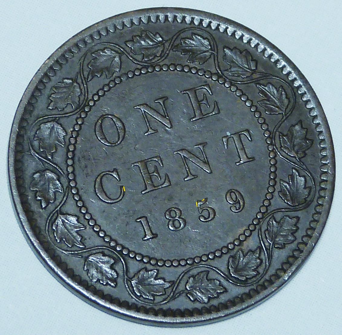 1859-Canada-Cent---Repunched-5---Please-Help-Identify?
