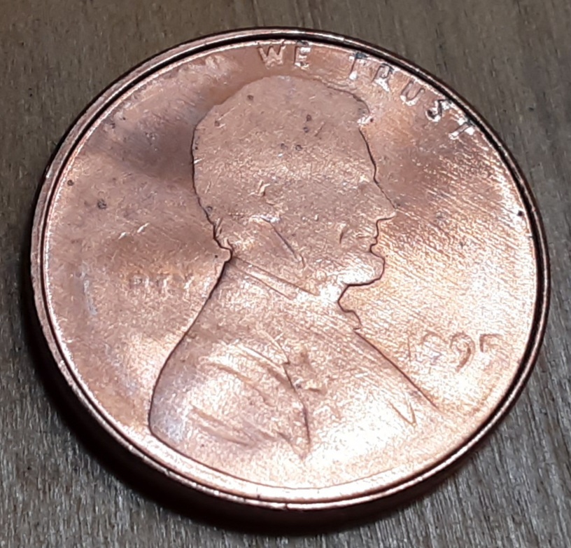 1995-Lincoln-Cent-Struck-Through-Both-Sides