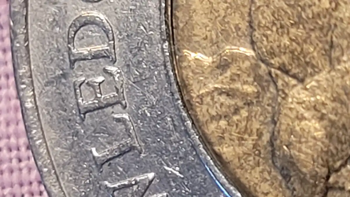 2000-Canadian-Knowledge-Toonie---Possible-Error-Under-The-First-