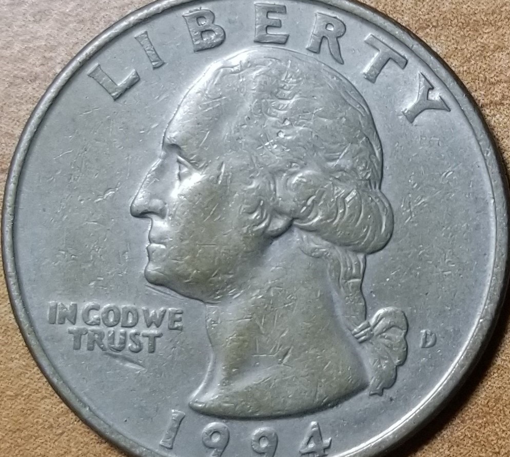 Stumped-On-Odd-Colored-Washington-Quarter-1994-D