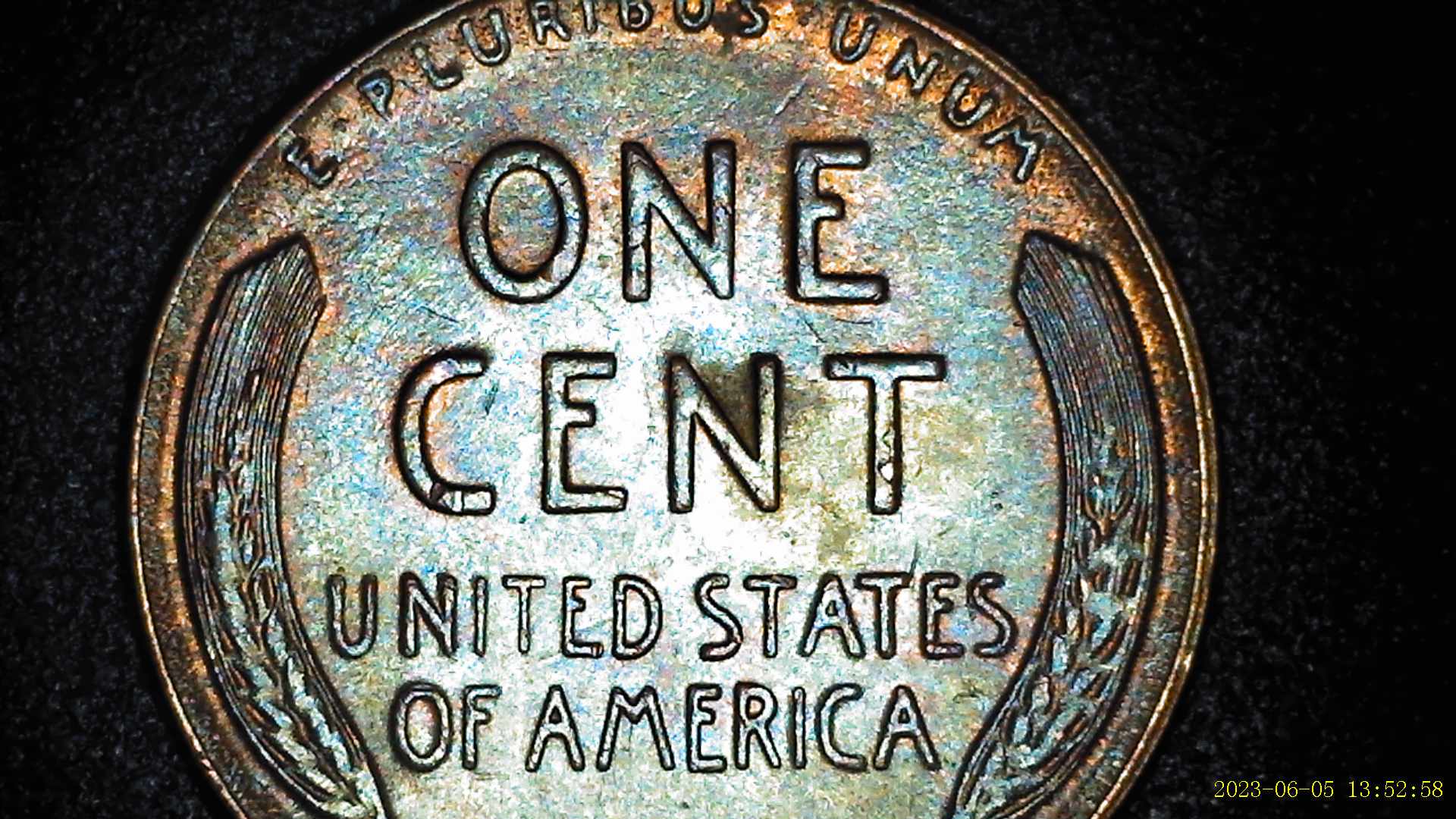 1955-Lincoln-Penny-Appearing-To-Have-Extra-Material-By-Ear-Lobe