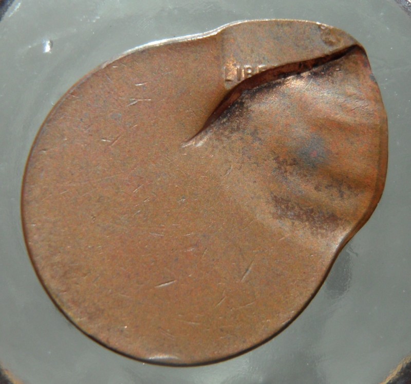 LMC-Error-Die-Struck-Off-Center-With-Obverse-Partial-Strike-Through