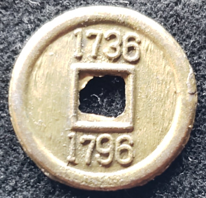 1736---1796-Foreign-Coin-With-Square-Hole