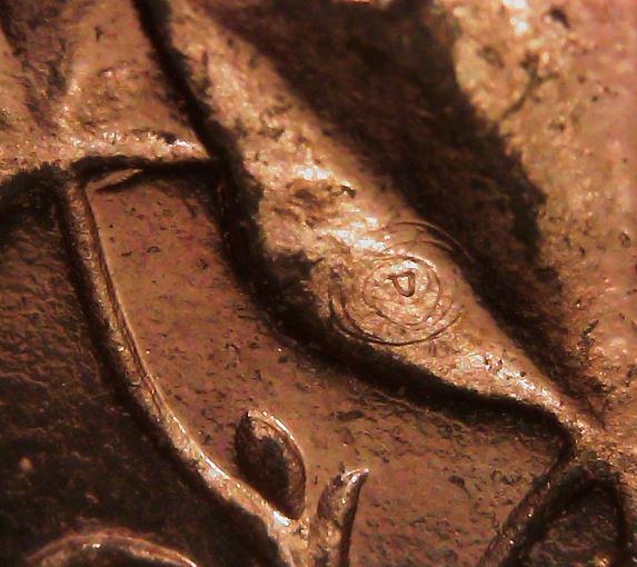 1966-Cent,-Odd-Circle-On-Leaf?