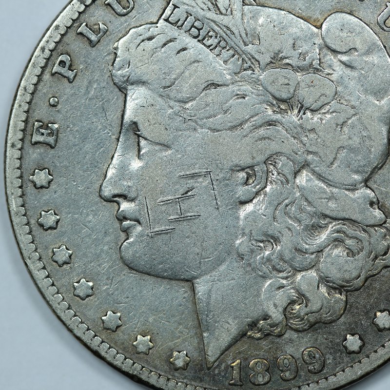 1899-P-Morgan-With-Odd-H-Mark-On-Face?