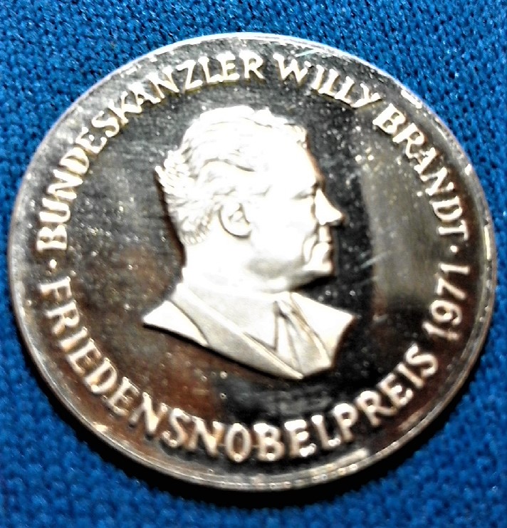 Token-Or-Medal-Which-Is-It