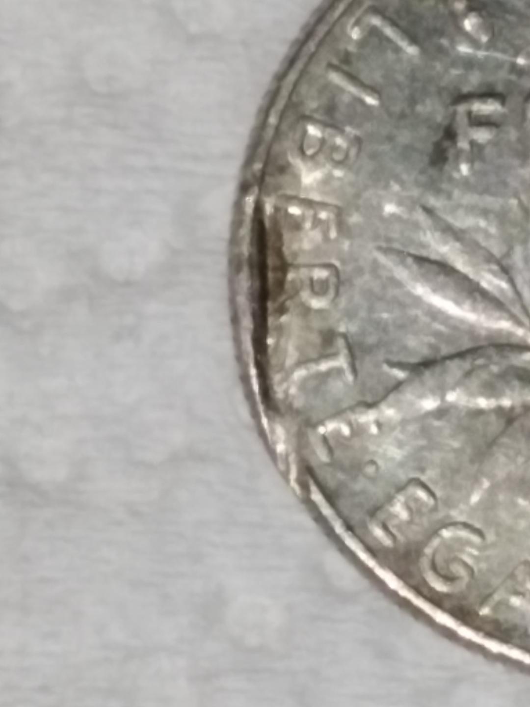 Please-Need-Help-With--1986-1/2-Franc-Republique-Fran�aise-.is-It-An-Error?