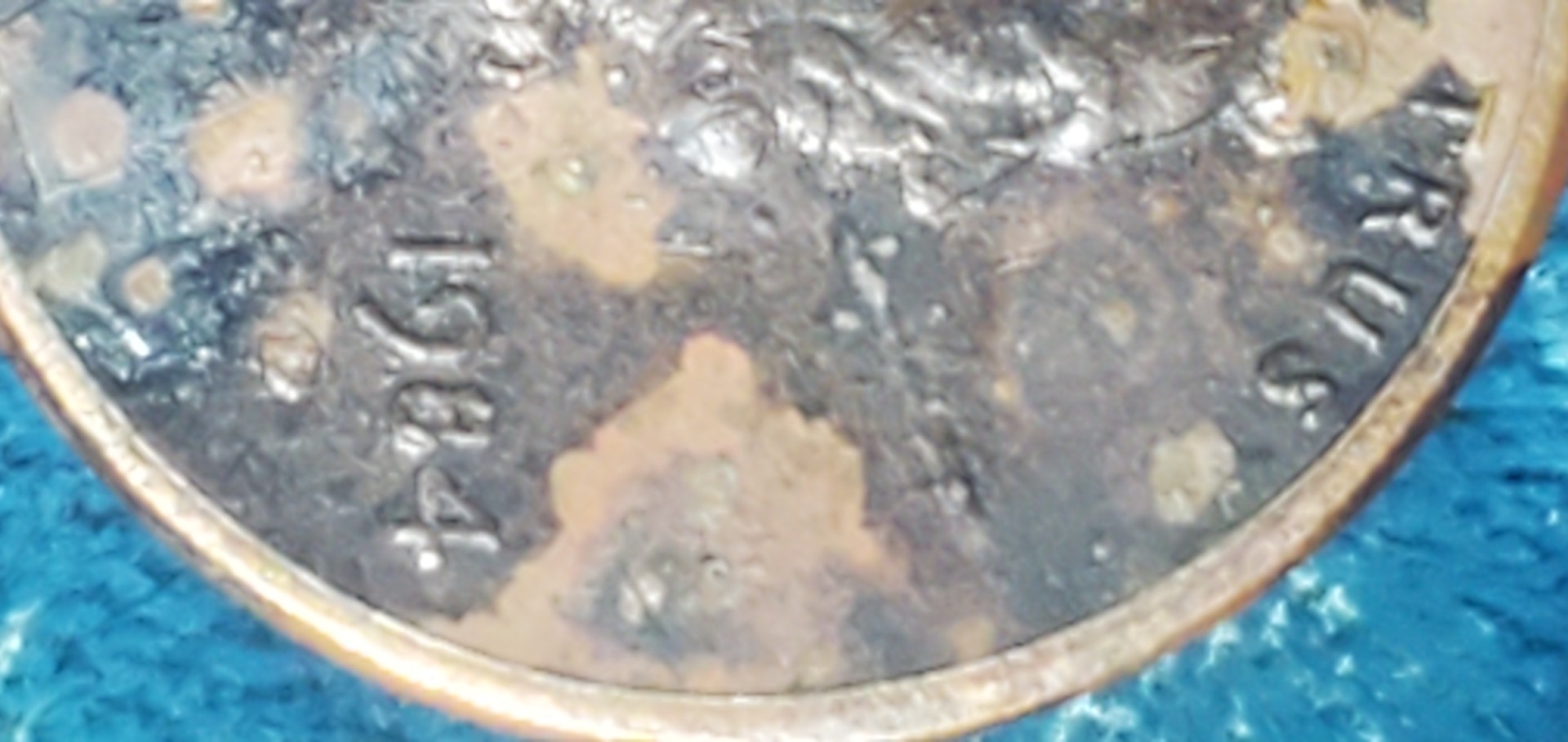 1984-D-Penny-Weird-Markings-Looks-Like-Broken-Die-Going-Through-His-Face