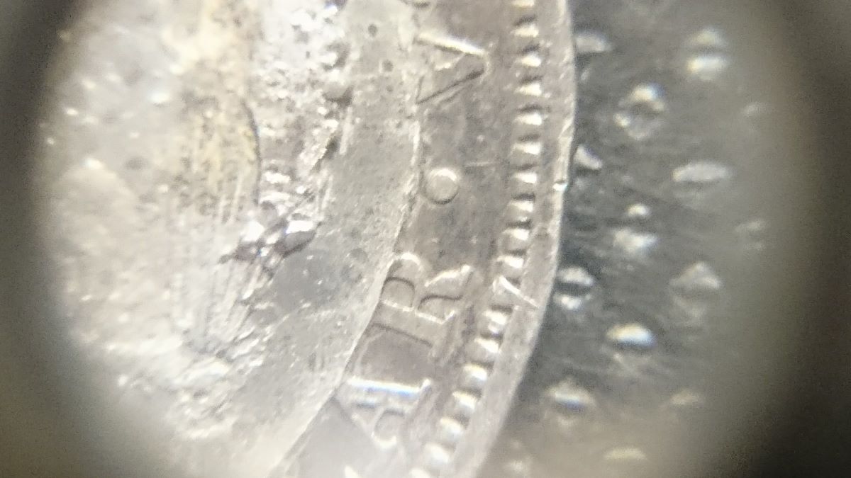 Can-Anybody-Help-Me-Understand-What's-Going-On-With-This-1904-Half-Dollar?