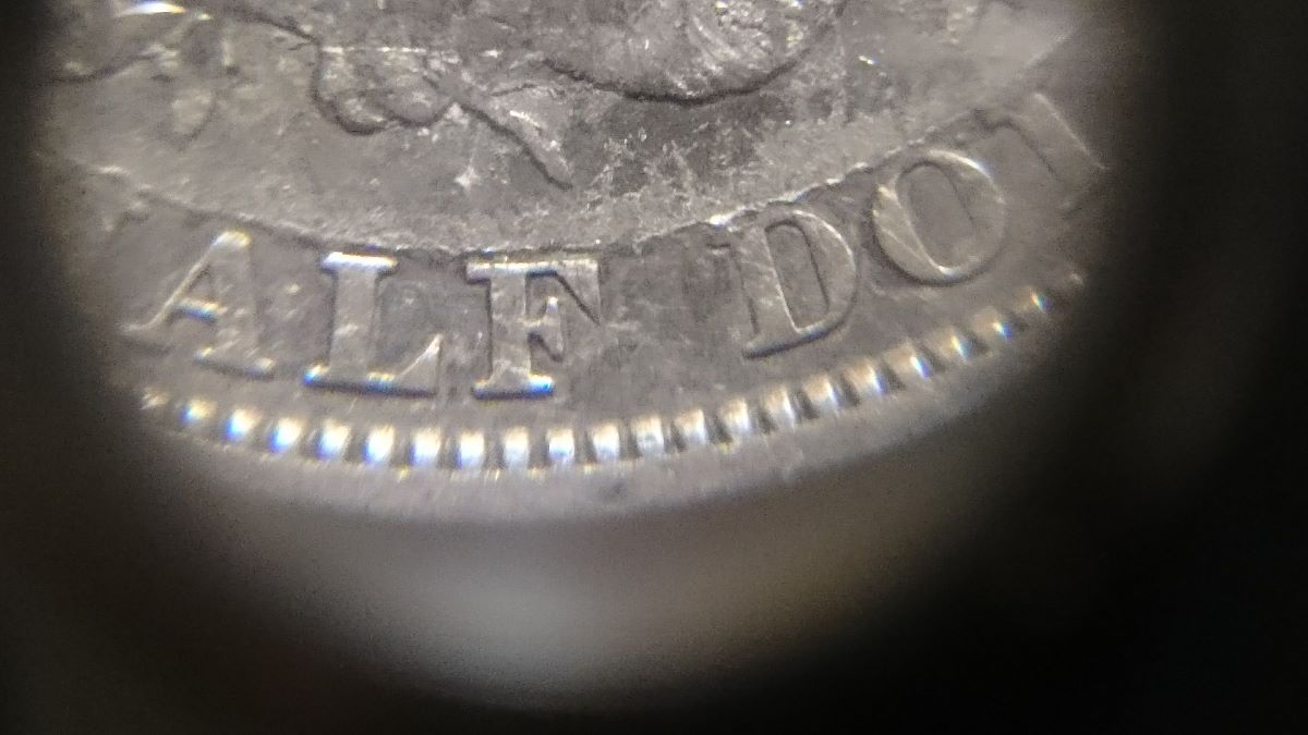 Can-Anybody-Help-Me-Understand-What's-Going-On-With-This-1904-Half-Dollar?