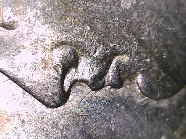 1889-O-Morgan-Dollar-Spiked-Wing?....vam?