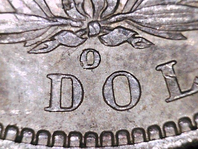 1889-O-Morgan-Dollar-Spiked-Wing?....vam?