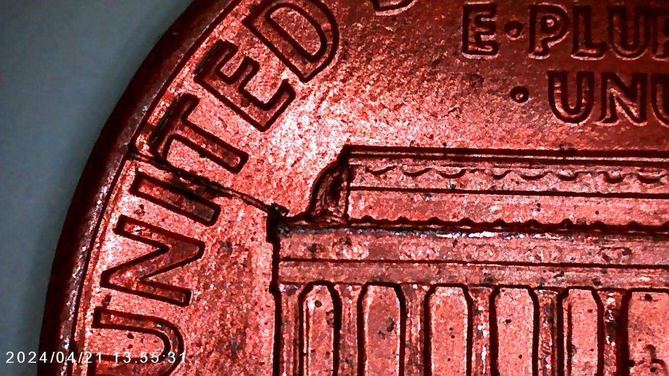 1992-LMC-With-Die-Break-&-Chip-Or-Plating-Blister?