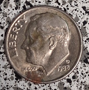 1988-D-Dime-Error.-On-The-Reverse-Side,-Top-Right-Side-You-Can-See-Like-Stripe-Marks,