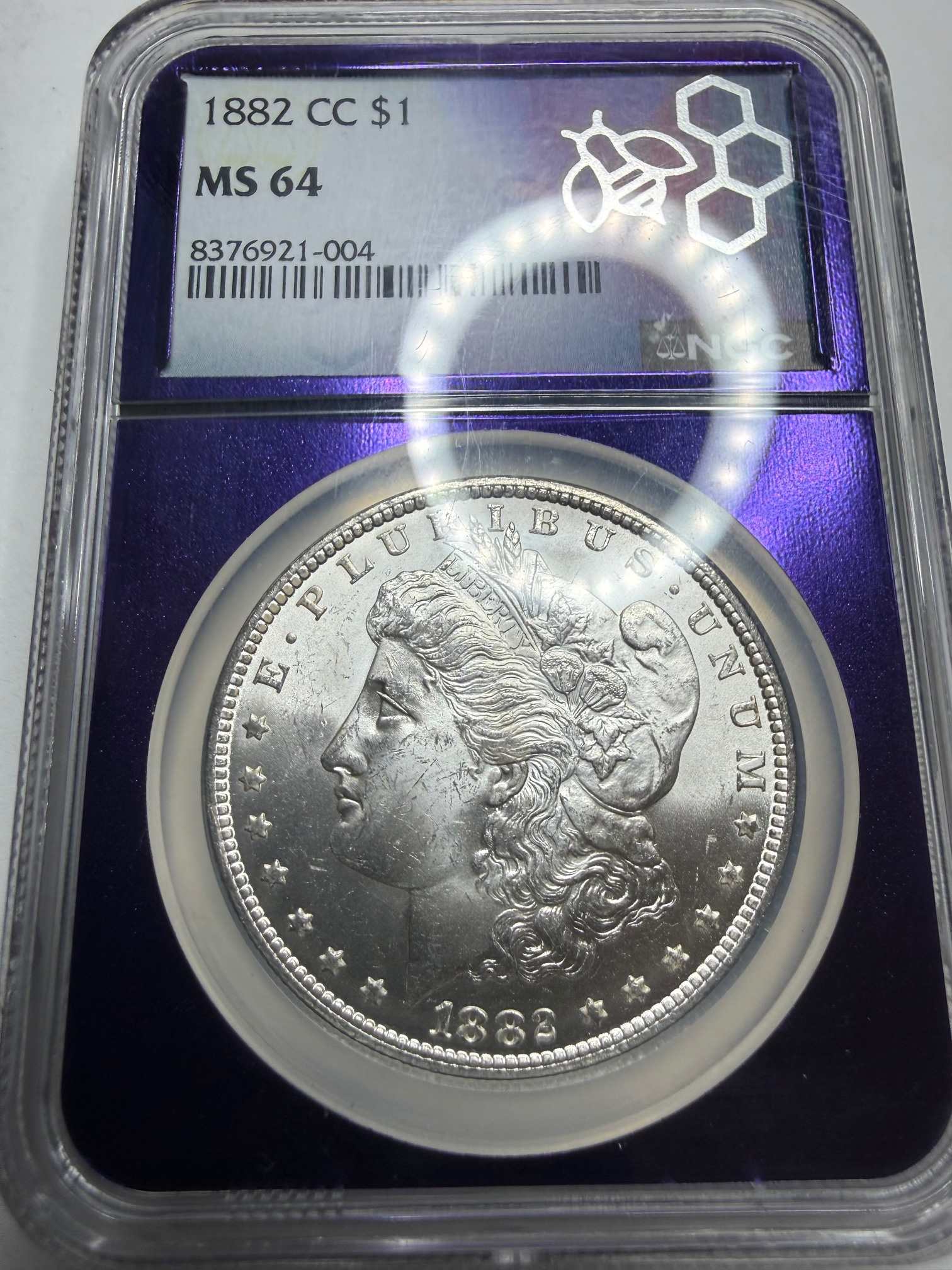 1882-CC-Morgan,-Slight-Tilt-&-Movement-In-NGC-Case