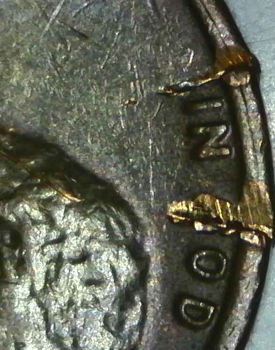 1982-Penny-Marks-On-Rim-And-Others-Damage?