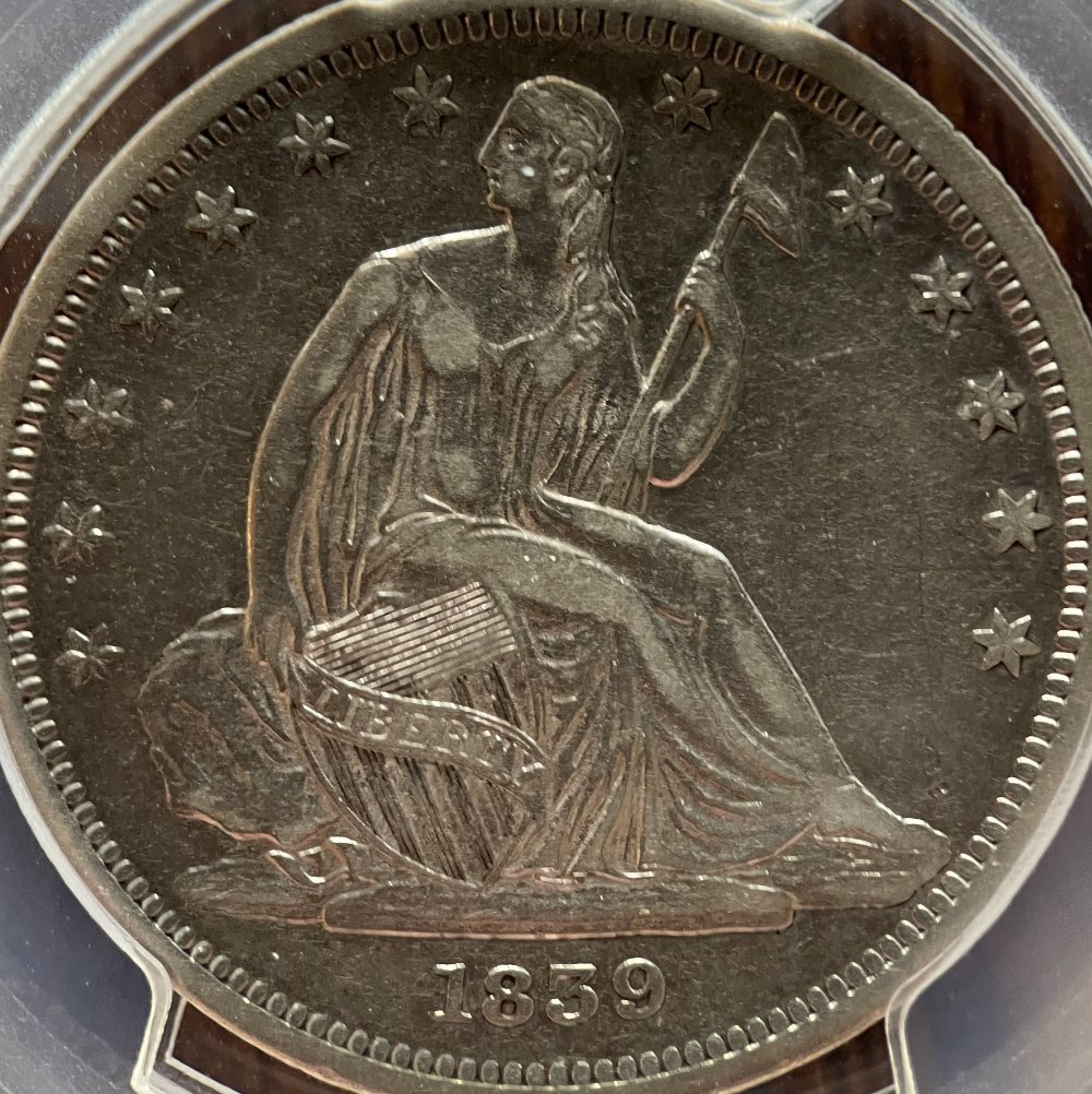 Something-A-Little-Curious-On-This-1839-No-Drapery-Seated-Liberty-Half