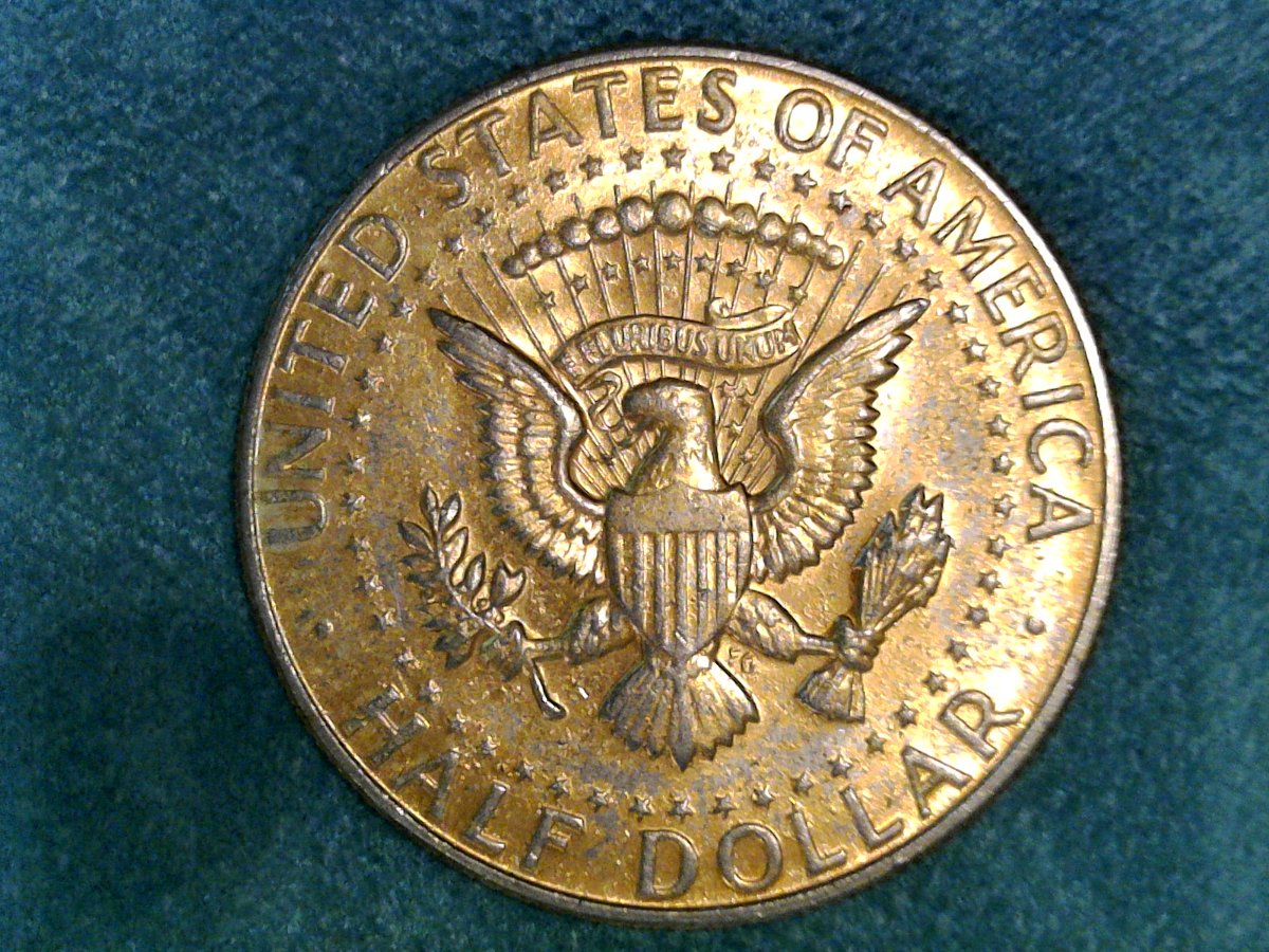 Strange-Gold-Tone-On-Kennedy-Half