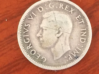 This-Canadian-1943-Ten-Cents-Coin-Has-A-Die-Break.