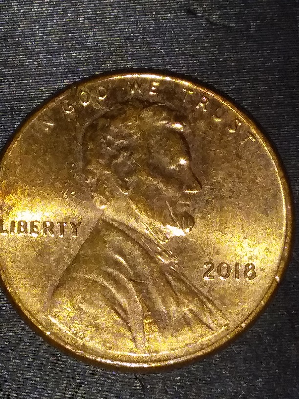2018-Penny-With-Light-Writing-,-Reverse.