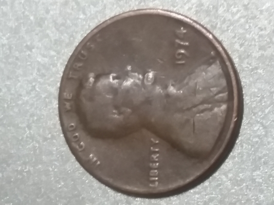 1974-Penny-Struck-Through-Grease-Or-Wear-And-Tear-Damage?