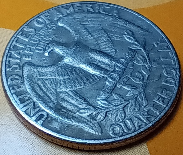 1970-[quarter]-Error-?-The-Coins-Looks-Like-It-Incase-Another-Coin