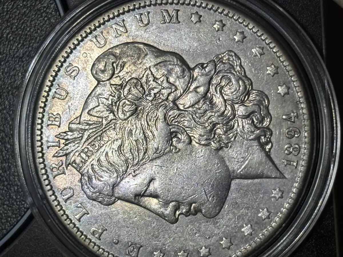 1894-O-Morgan-Weak-Strike-Or-Worn-Breast-Feathers