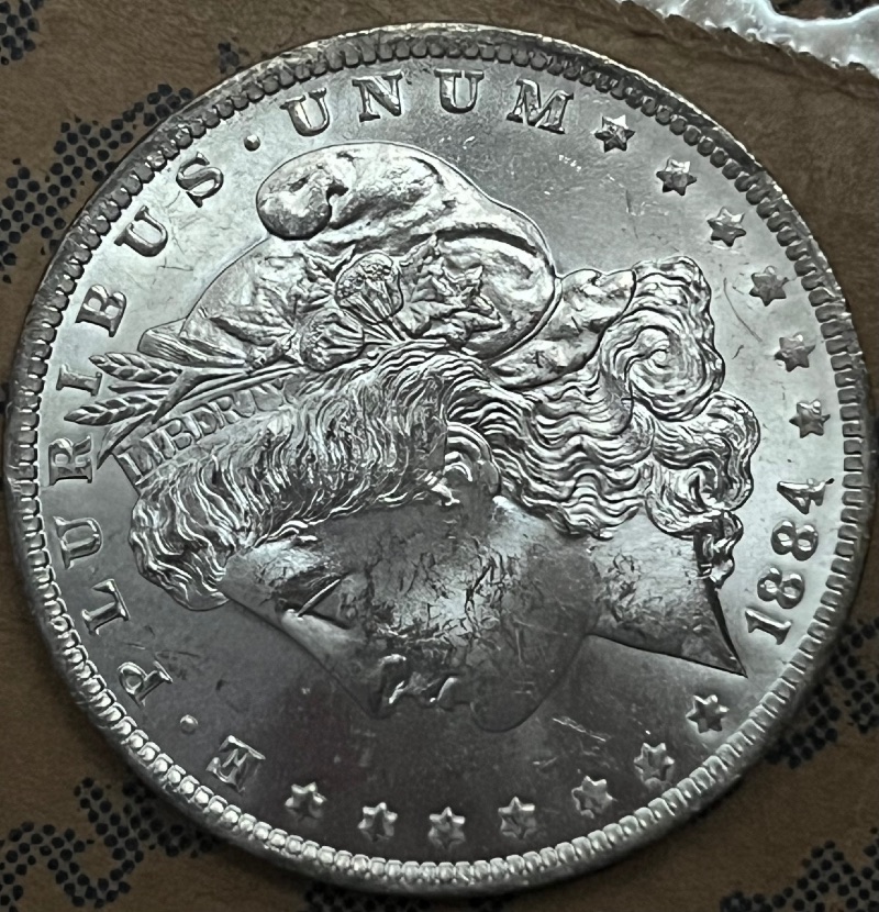 Toned-1884-O-Morgan-Dollar-For-Grading